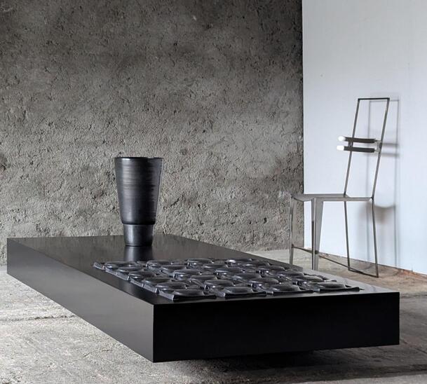 tall ebonised coffee table with black ceramic tiles